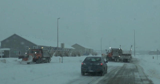 Powerful winter storm brings rain and snow for holiday travelers