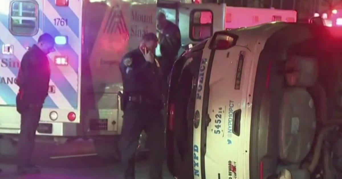 2 NYPD Officers Injured When Cruiser Overturns In Chelsea - CBS New York