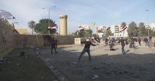 Troops at U.S. Embassy in Iraq fire tear gas at pro-Iran protesters