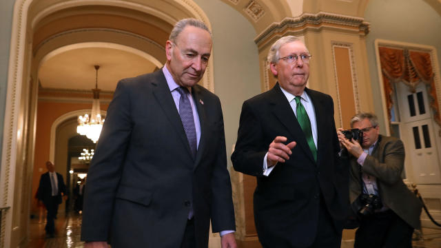 Senate Major Leader McConnell (R-KY) And Senate Minority Leader Schumer (D-NY) Walk To Senate Chamber Together After Budget Deal Reached 
