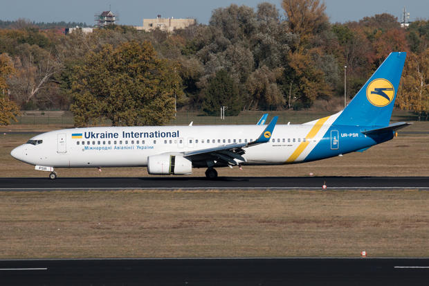 Ukraine International Airlines Boeing 737-800 with the registration UR-PSR, taxis at Berlin Tegel airport 