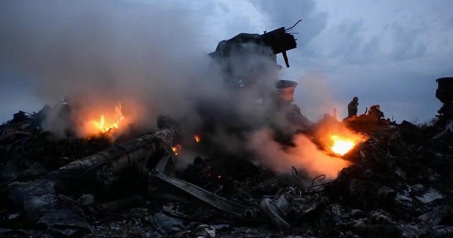 Holes in Iran plane crash wreckage raise new questions