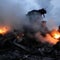 Holes in Iran plane crash wreckage raise new questions