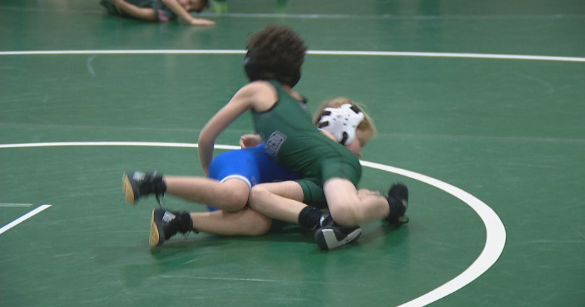 'We Ride For Those Who Died' Youth Wrestlers Help Raise Money To