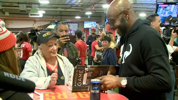 Jerry Rice signing copies of his new book 