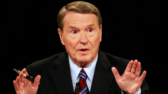 Veteran PBS anchor and debate moderator Jim Lehrer asks a question during the first presidential debate between Senator John McCain and Senator Barack Obama at the University of Mississippi in Oxford, Mississippi, on September 26, 2008. 