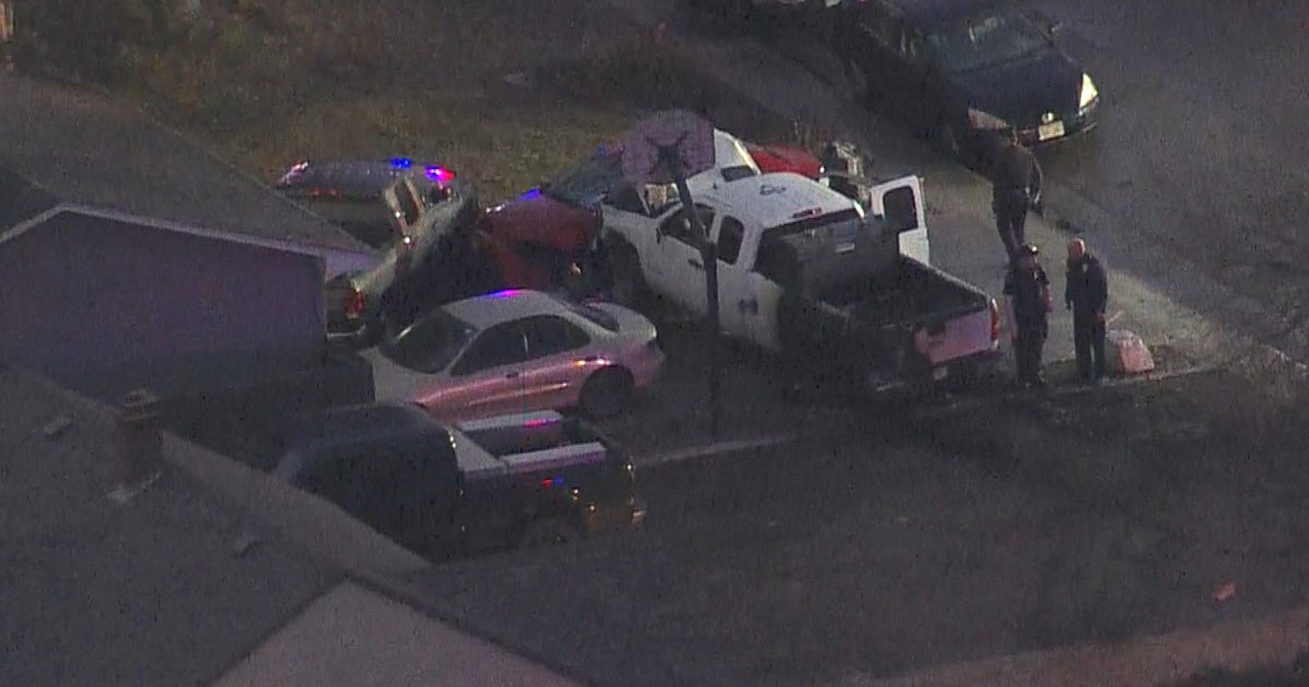 Truck Crashes Into 2 Parked Cars In Brighton, Bursts Into Flames CBS(02)