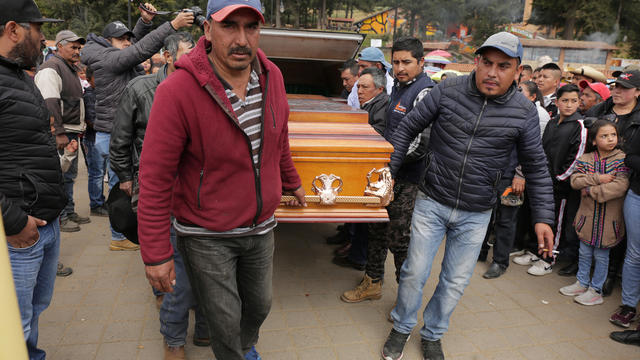 Relatives and friends carry the coffin of environmental activist Homero Gomez, during his funeral service in the western Mexican state of Michoacan 