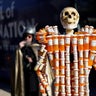 A sculpture made out of opioid pill bottles is set up next to Democratic presidential candidate and former Vice President Joe Biden's campaign bus in Somersworth 