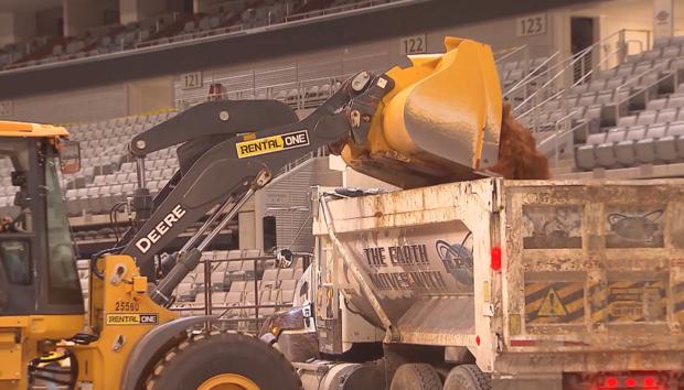 Moving dirt out of Dickies Arena 