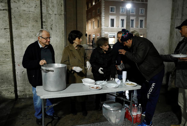 Dino Impagliazzo, Rome's 90-year-old 'chef of the poor', gives food to homeless living outside the Vatican 