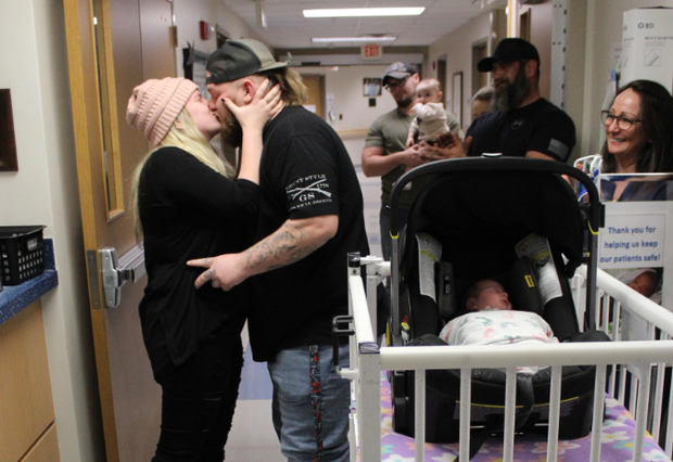 Dad proposes to mom outside NICU