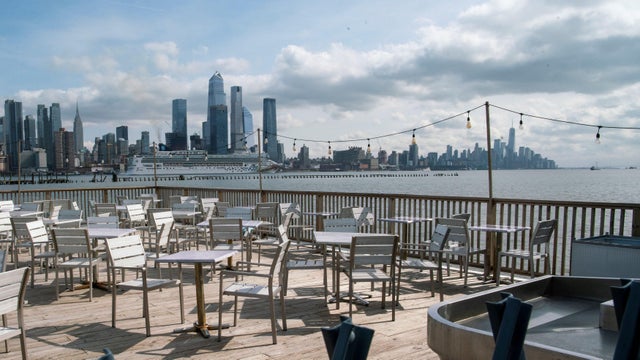 Empty chairs are seen at the deck of a local restaurant that is closed due to the outbreak of coronavirus disease (COVID-19), in Hoboken 