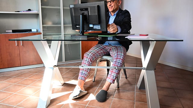 Smart Working in Pajama Pants and Slippers 