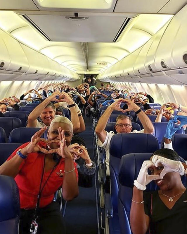 Bravery, Courage, & Sacrifice': Photo Shows Health Care Workers On Plane To  Join Coronavirus Battle In NY