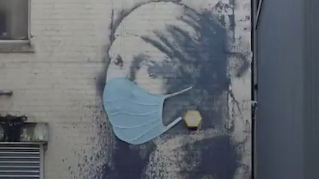 Banksy-with-mask.png 