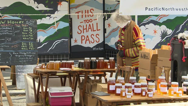 A Seattle farmers market reopens - CBS News