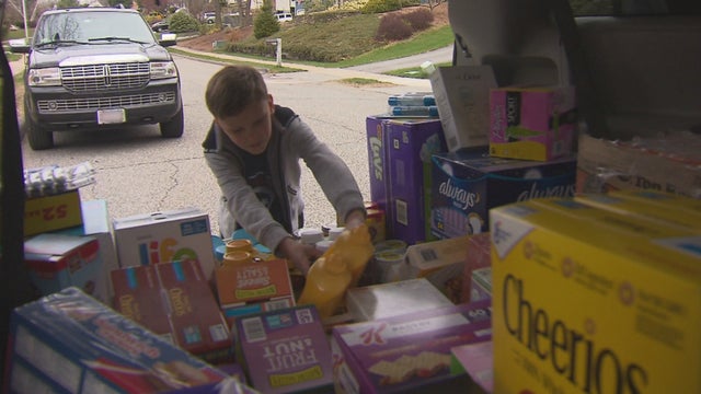 MARLBOROUGH-BOY-DONATES-FOOD-BURTON-PKG-WBZ-1_frame_573.jpg 