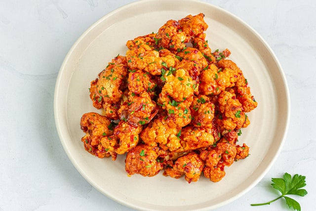 Buffalo Cauliflower Bites on White Background 