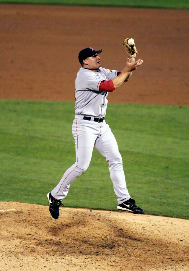 Keith Foulke and Jason Varitek by Jed Jacobsohn