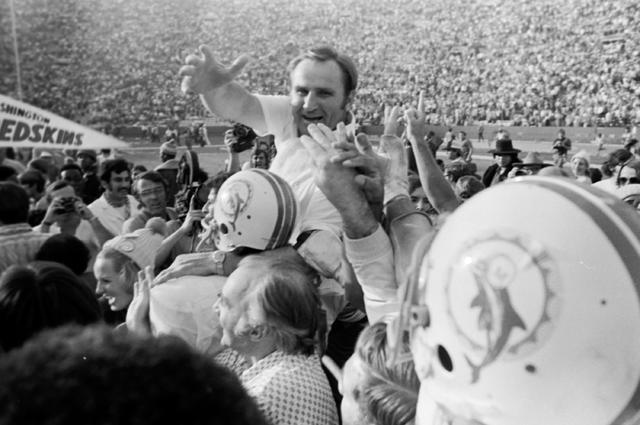 Miami Dolphins coach Don Shula is congratulated at the finish of the  perfect season on Dec. 16, 1972 against the Baltimore Colts. (Photo by  Miami Herald file photo/TNS/Sipa USA Stock Photo 