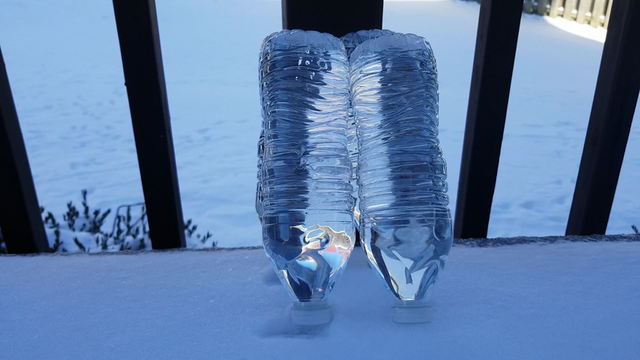 grabbed a frozen water bottle and the bubbles in the ice were kinda cool. :  r/mildlyinteresting