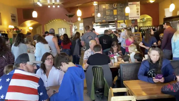 Crowd of people are seen at the C&C in Castle Rock restaurant, celebrating Mother's Day amid the coronavirus disease (COVID-19) outbreak, in Castle Rock 