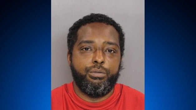 Eugene-Cooper-Mug-Shot.jpg 