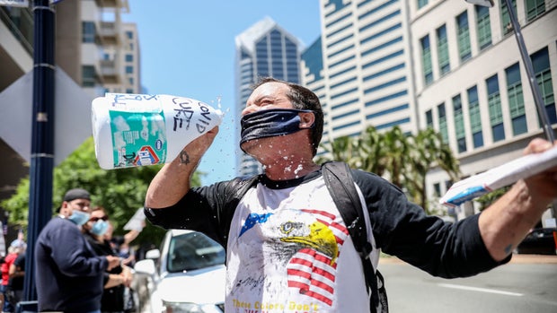 Coronavirus face masks: America reacts and rebels