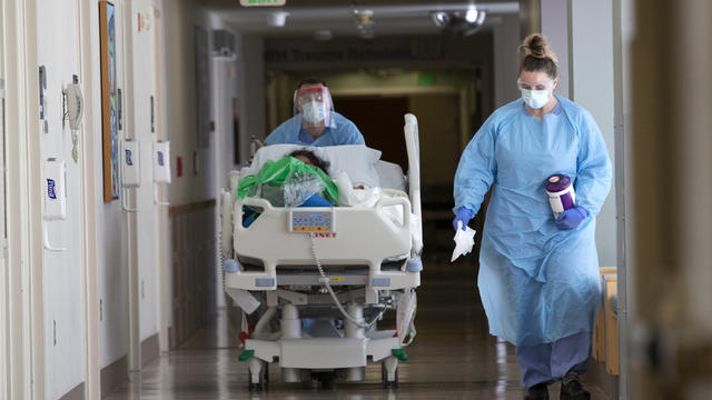 Health Care Professionals Treat Coronavirus Patients On The Acute Care Floor Of Harborview Medical Center 