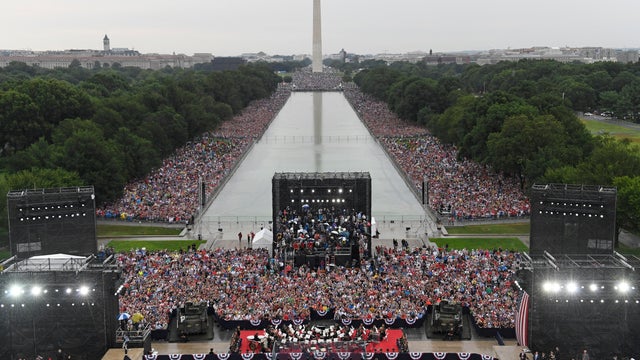 Air Force One does a fly-by as U.S. President Donald Trump and first lady Melania Trump arrive for the "Salute to America" event during Fourth of July Independence Day celebrations at the Lincoln Memorial in Washington 