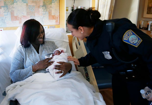 Officers Visit Newborn After Mother Gives Birth Outside Police Station