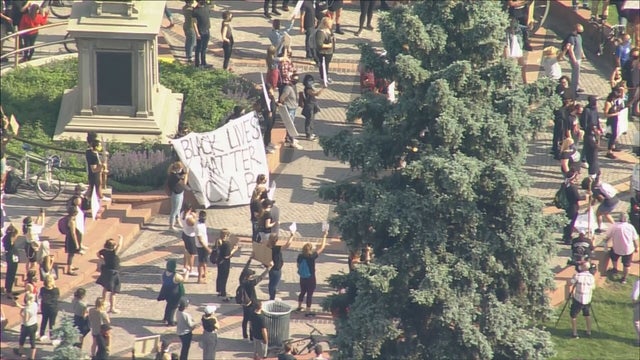 police accountability rally protest denver capitol 