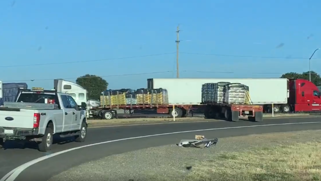 big-rig-turning-from-highway-99-on-ramp.png 