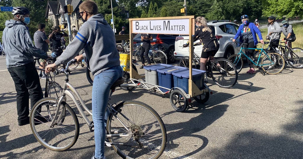 Peaceful Protesters Pedal Across Town To Show Support For The Black