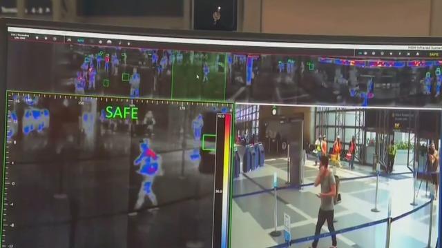 cbsn-fusion-trial-airport-scanners-take-temperatures-and-check-for-fevers-at-lax-thumbnail-503833-640x360.jpg 