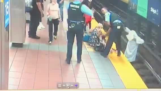 septa-woman-saved-on-tracks.jpg 