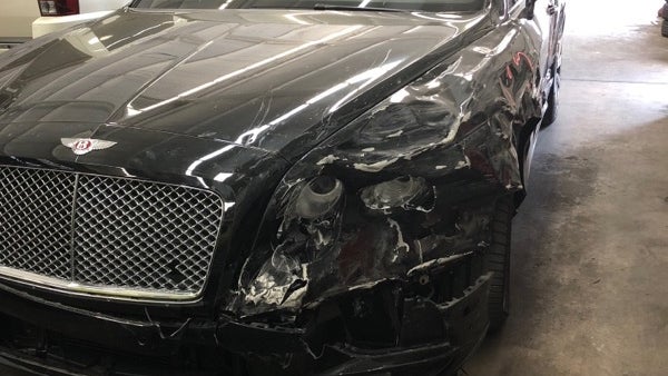 luxury-car-lease-scam-trashed-Bentley.jpg 