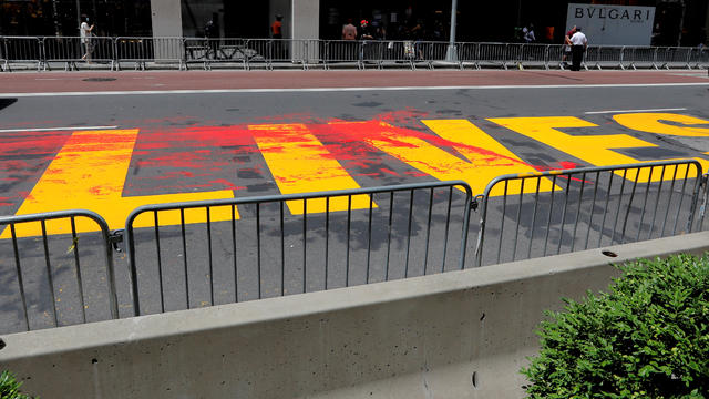 "Black Lives Matter" mural vandalized with red paint along 5th Avenue outside Trump Tower in New York City 