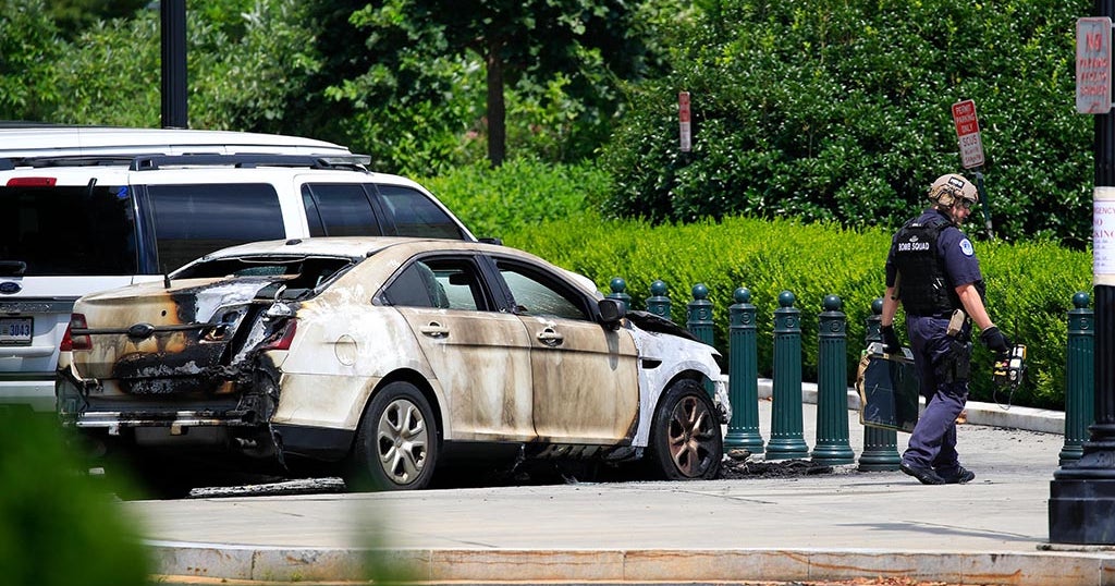 Man In Custody After Supreme Court Police Vehicle Set On Fire - CBS ...