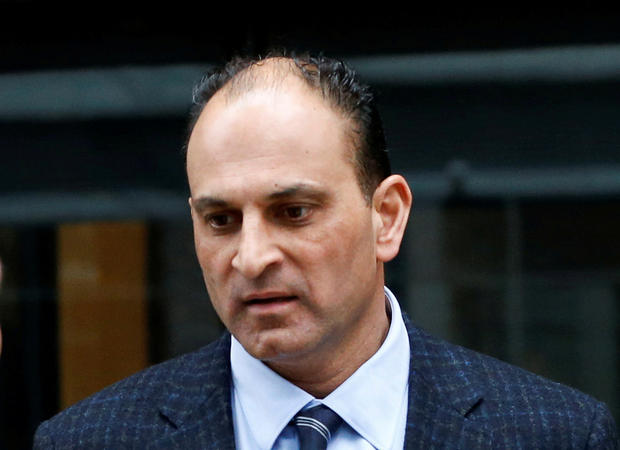 FILE PHOTO: David Sidoo, a Vancouver businessman and former Canadian Football League player, leaves the federal courthouse 