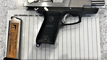 0721handgunbwi.jpg 