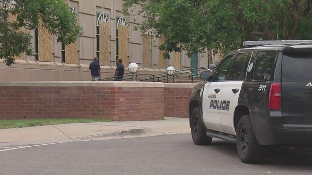 aurora courthouse damage police car 