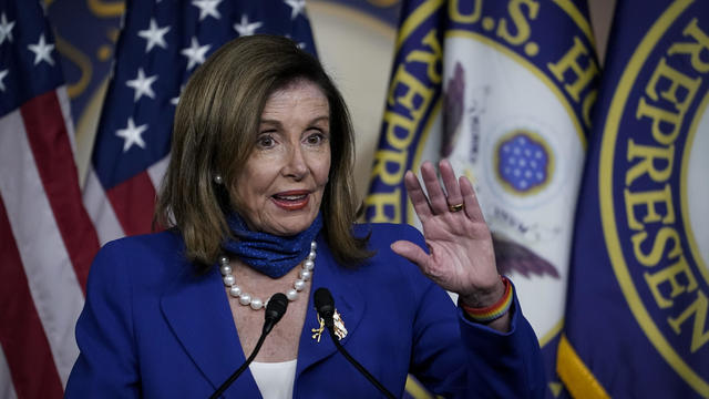 FILE PHOTO: Speaker of the House Pelosi delivers remarks during a weekly news conference on Capitol Hill in Washington 