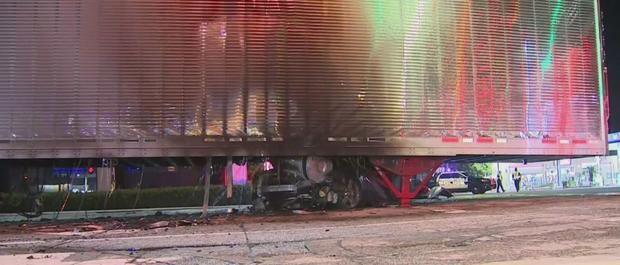 No Serious Injuries After Car Gets Wedged Under Semi-Truck In Lennox, Catches Fire 