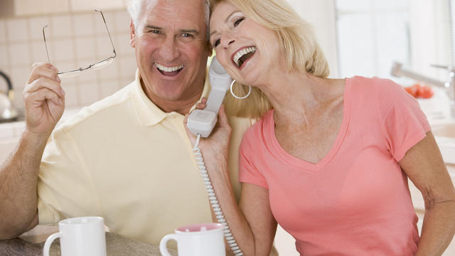 Couple-Using-Telephone.jpg 