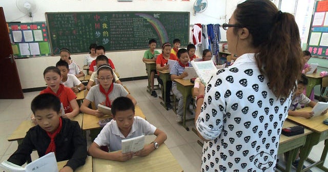 China tests ban on homework to the delight of students - CBS News