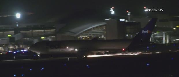 FedEx Plane Makes Emergency Landing At LAX After Landing Gear Malfunction 