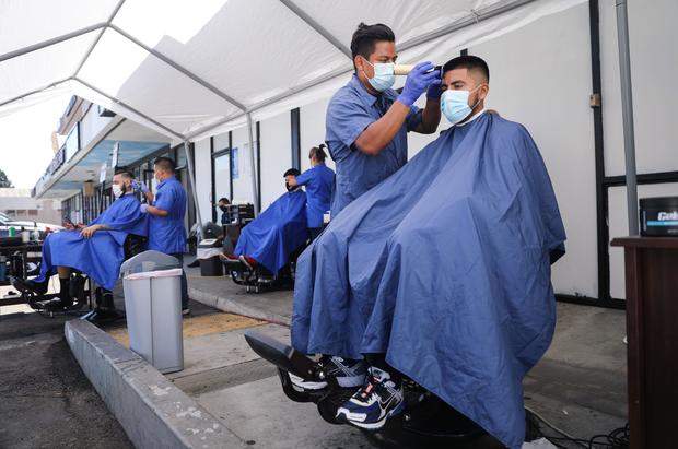 Barbershops Give Outdoor Cuts Amid Coronavirus Pandemic 