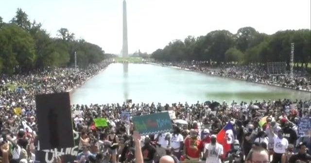 Tens of thousands march on Washington to demand racial justice - CBS News